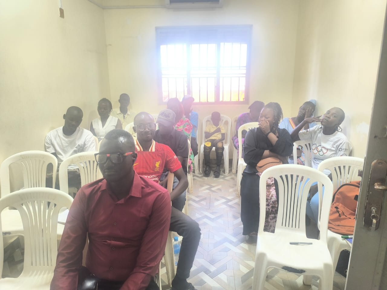 Participants seated in a training room during an ILA leadership and human rights training session.